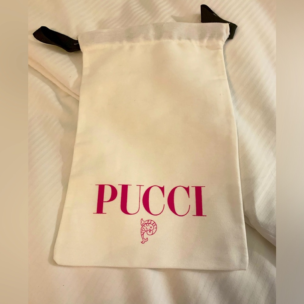 Brand new rare and authentic dust bag, smaller size with strings.Must  have!